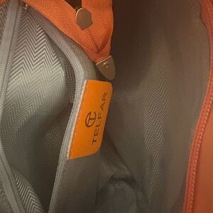 Telfar Bag with Orange Highlights and Gray Lining